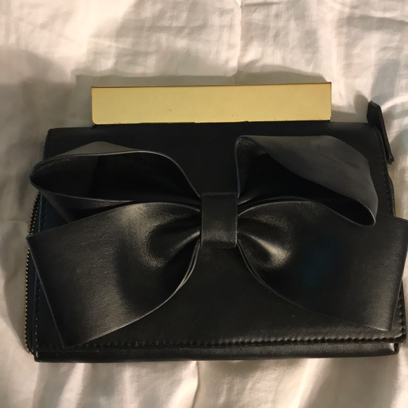 bebe Handbags - Bebe black bow clutch